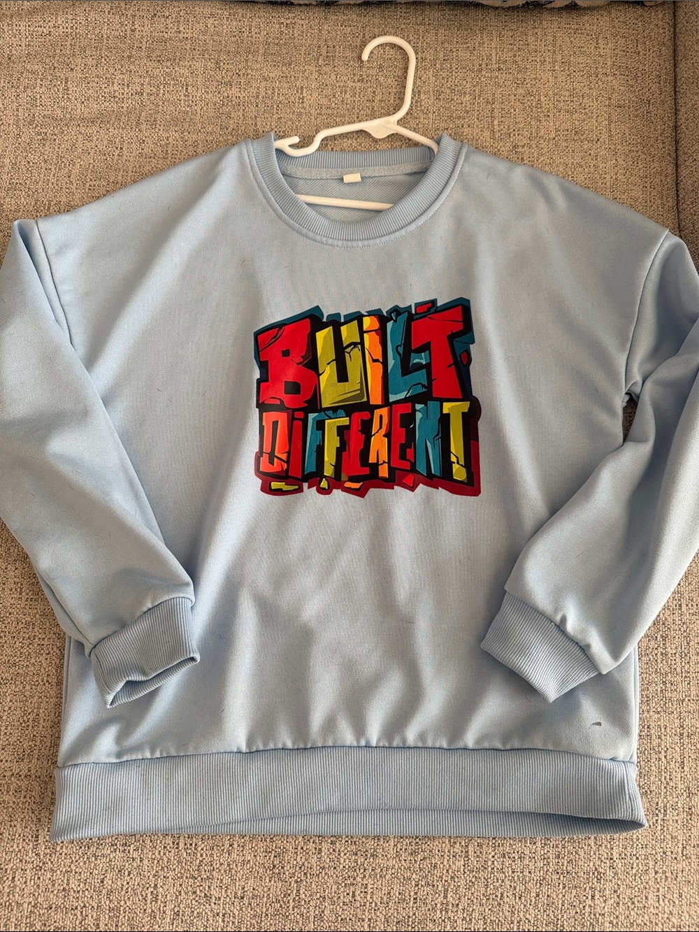 SHEIN Light Blue Sweatshirt with Multicolor 'Built Different' Graphic